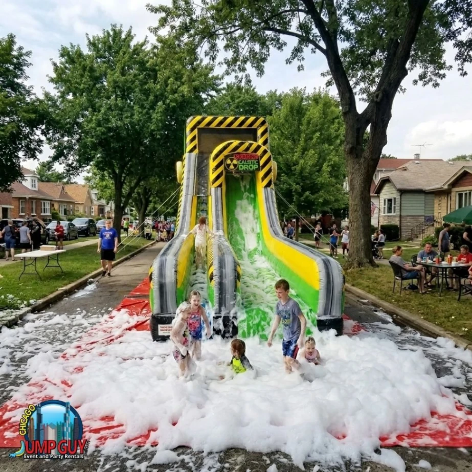20-foot Caustic Drop water slide with foam machine combo product card for Glencoe IL premium summer events and block parties